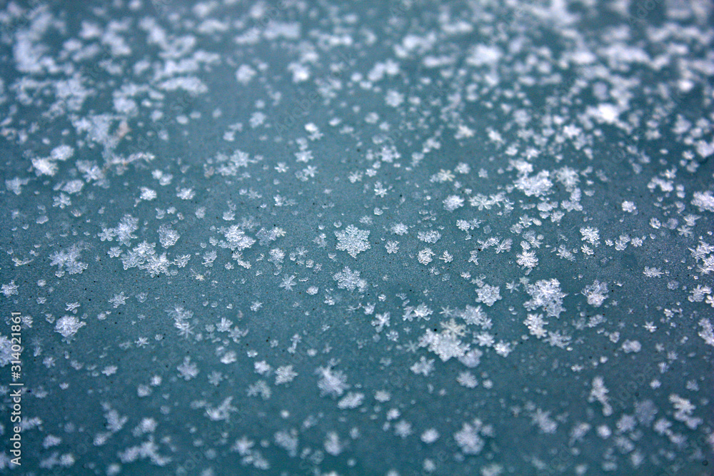 background of snowflakes on a blue background