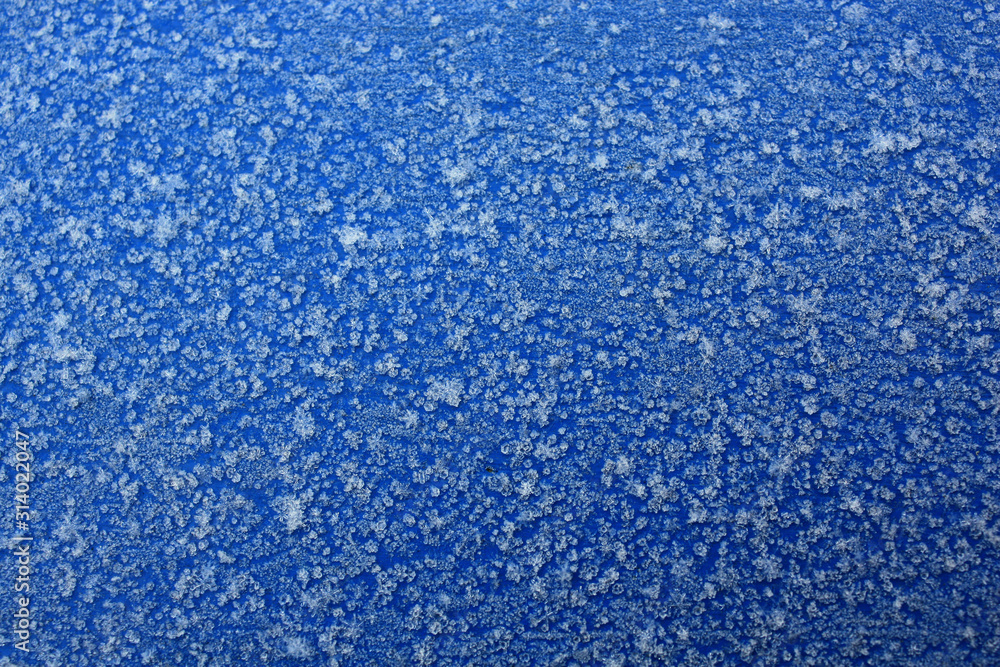 abstract background of snowflakes on a blue background
