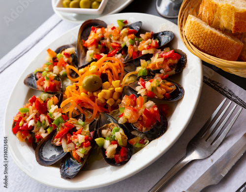 Tasty mussels with vinaigrette from fresh vegetables, nobody