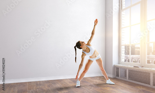 Woman making stretching. Mixed media