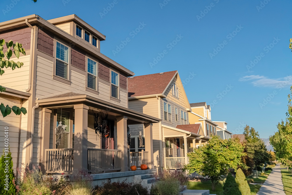 Row of urban houses with front porches Row of urban houses with front porches