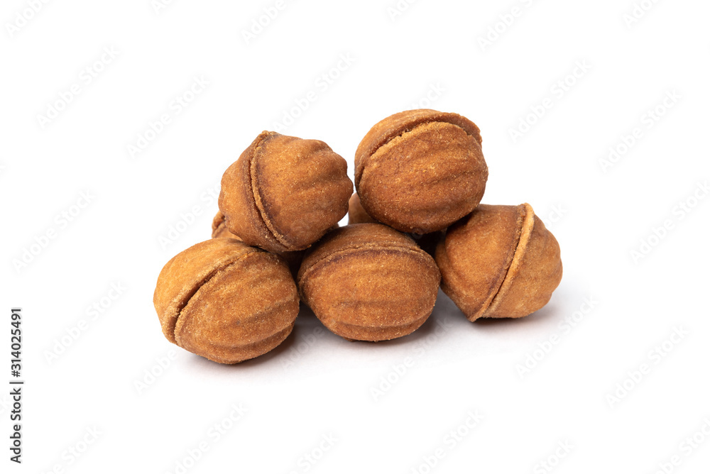 Shortbread in shape nut with caramel isolated on white background. Shortbread in shape nut with caramel isolated on white background.