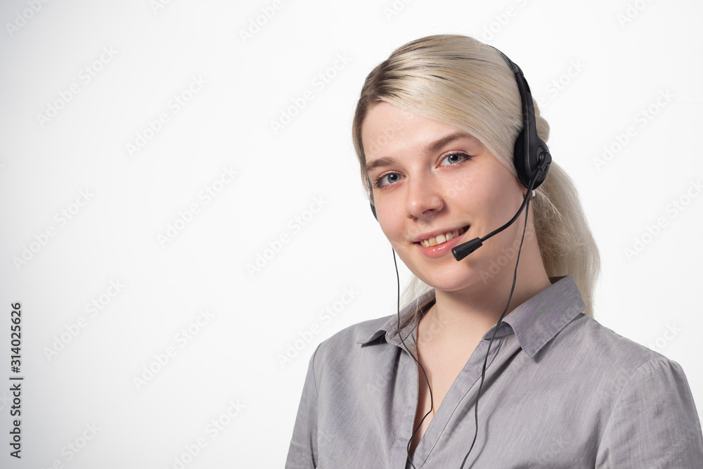 Portrait of attractive business woman with headset isolated over white background with large area for your text. Portrait of attractive business woman with headset isolated over white background with large area for your text.