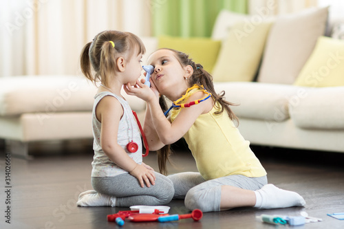Child girl and toddler sist...