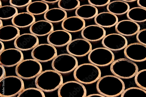 Abstract background of cardboard rings. Cropped shot of firework boxes. Abstract graphic texture background.