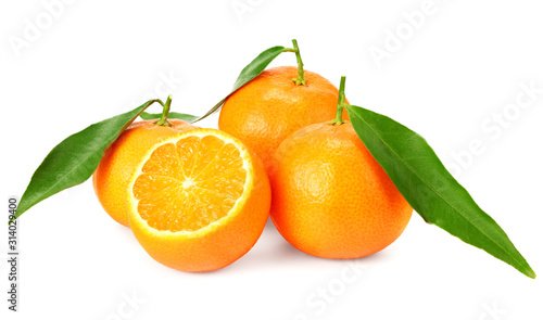 mandarin with slices and green leaves isolated on white background