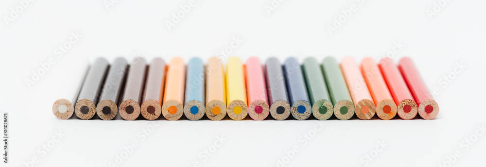 Multi color pencils. the concept of a multinational family and equality in the world.