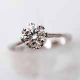 Close up of an elegant engagement diamond ring.