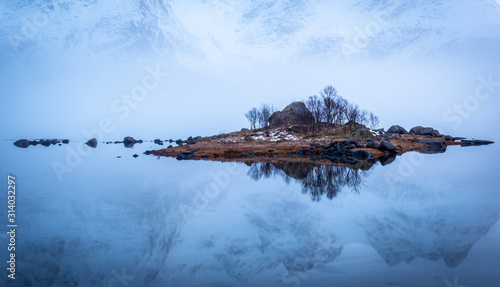 island reflection on the northern sea, ocean winter artistic  frame