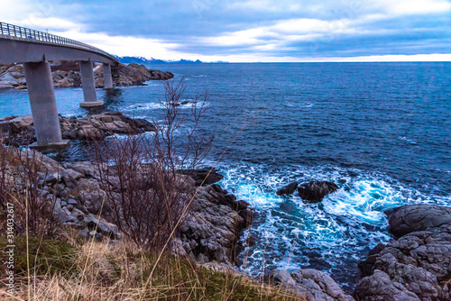 waves on the rocks , northern sea coast, coastline frame, winter blue cold