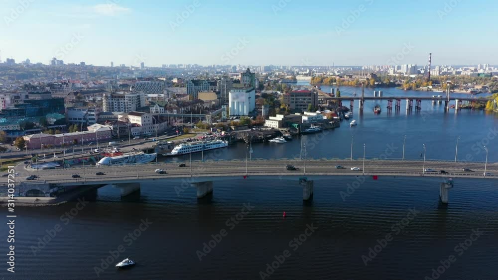 City traffic in Kiev across the Dnieper River near Podil City traffic in Kiev across the Dnieper River near Podil
