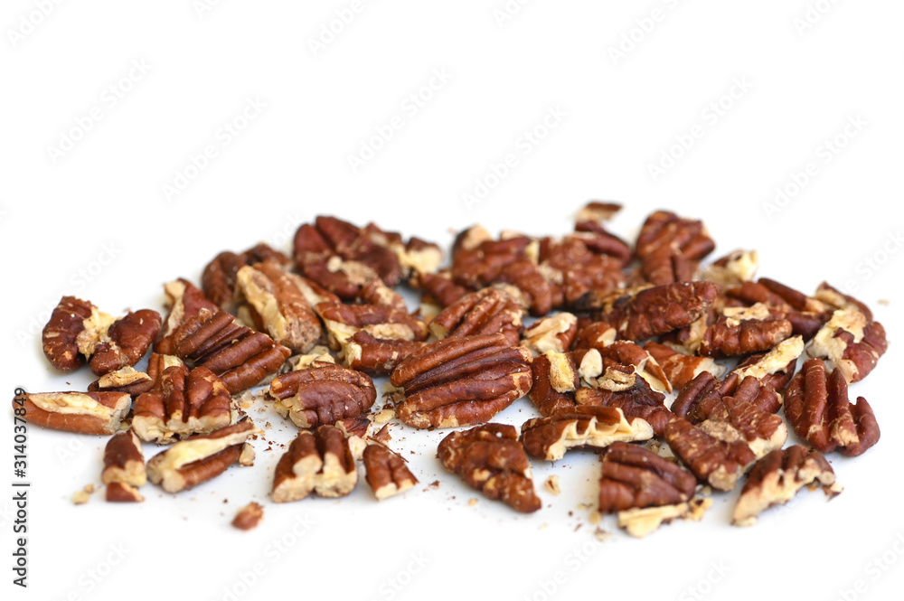 Chopped pecan on white background - isolated Chopped pecan on white background - isolated