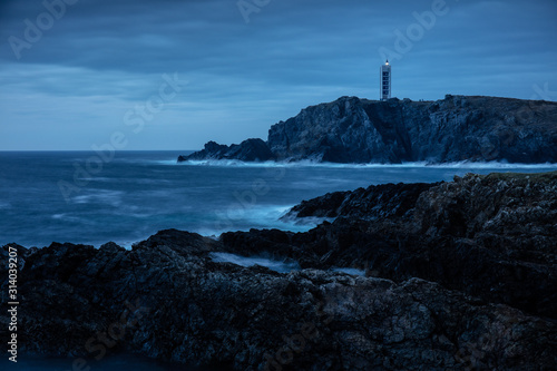 Casi de noche. Acantilados de Valdoviño y Faro de Meirás (también conocido como faro de Punta Frouxeira). photo