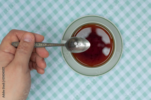 pour three teaspoons of sugar substitute into a teaspoon of tea. one tablet replaces 1 teaspoon of sugar
