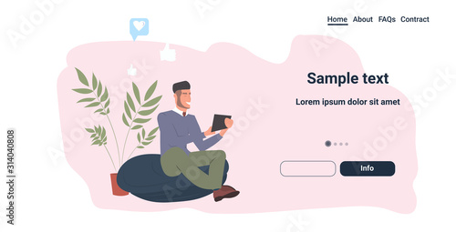 man using mobile application on tablet pc online communication social media network concept guy sitting on beanbag full length horizontal copy space vector illustration