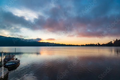 A beautiful sunrise at a Lake Bratan. Bali island, Indonesia. © umike_foto