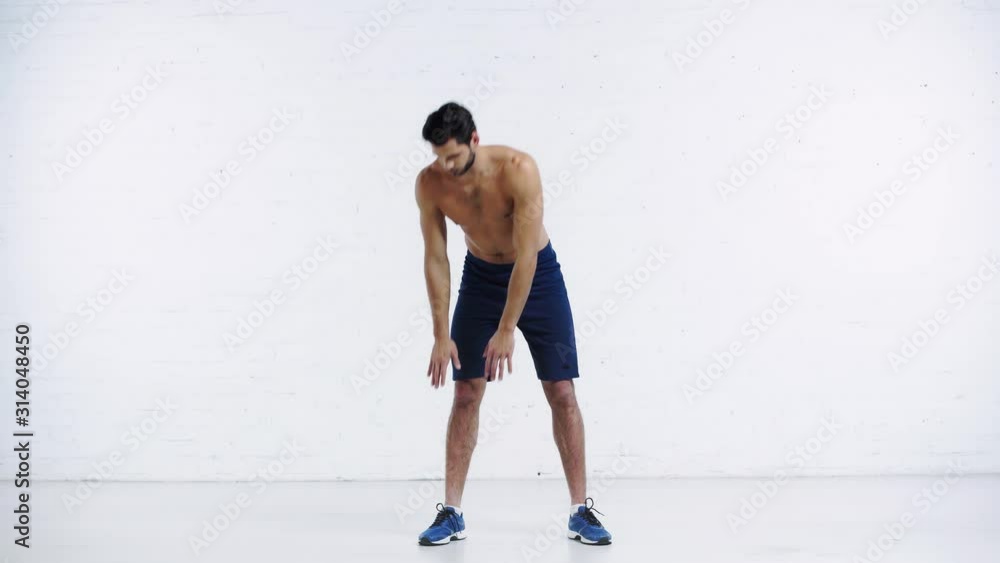 sportsman doing forward leaning on white background sportsman doing forward leaning on white background