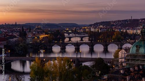 Panorama, dawn over the city of Prague, Czech Republic, aerial view on Manes Bridges, Charles Bridge and Legion Bridge. Morning mood concept.