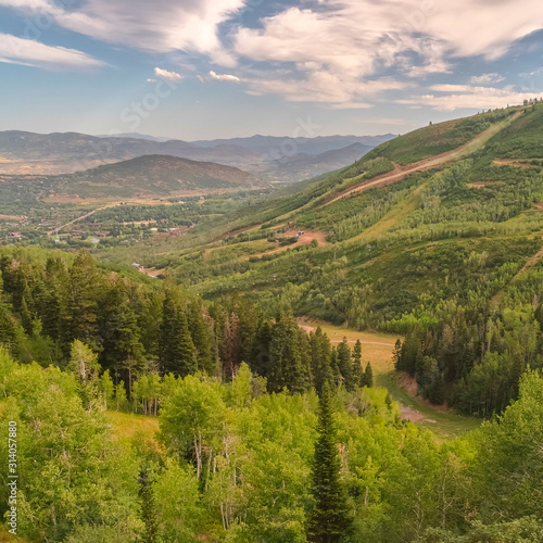 Square Hiking trails and green trees on a ski resort mountain in Park City in summer