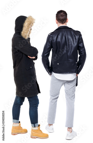 Back view of couple in winter jacket. © ghoststone