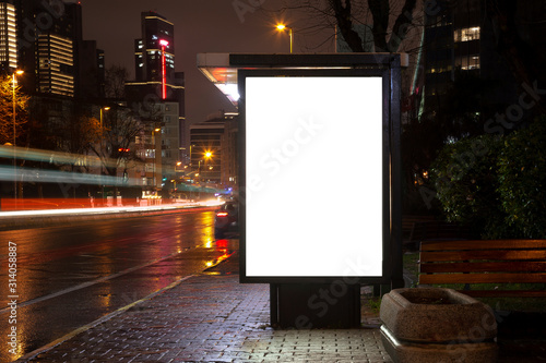 Blank billboard on night street
