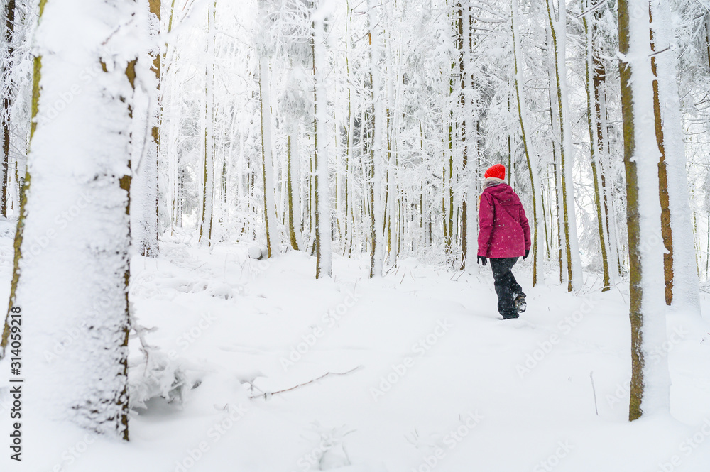 Woman and white snowy winter nature, edit space