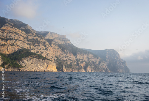 Seascape with views of the mountains near the coastline. © vvicca