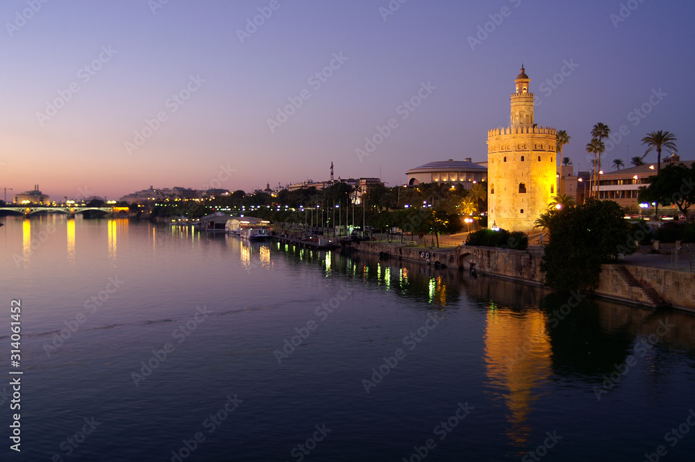 Seville (Spain). Torre del Oro next to the Guadalquivir river in the city of Seville