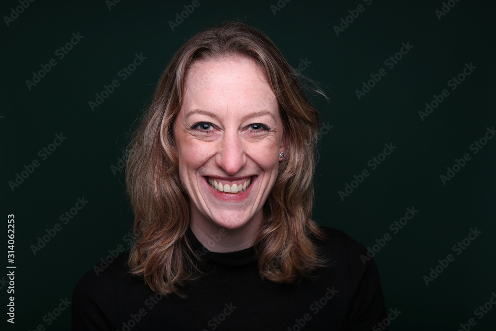 Beautiful woman in front of a background Beautiful woman in front of a background