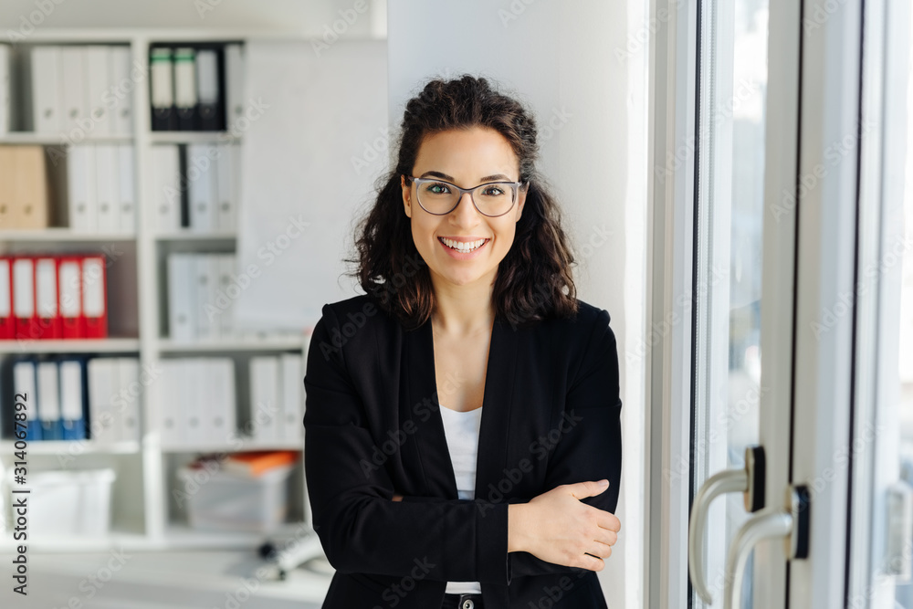 Fototapeta premium Cute friendly businesswoman with welcoming smile