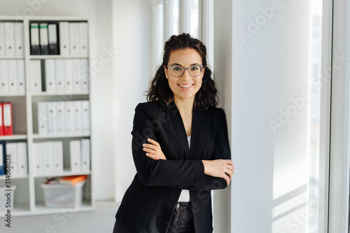 Happy relaxed young professional woman
