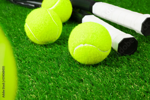 Tennis balls on grass close up. Tennis equipment