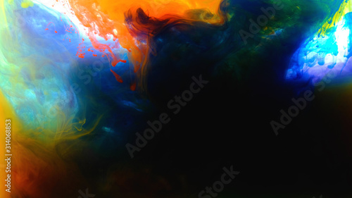 Color paint drops in water , abstract color mix , drop of Ink color mix paint falling on water Colorful ink in water,