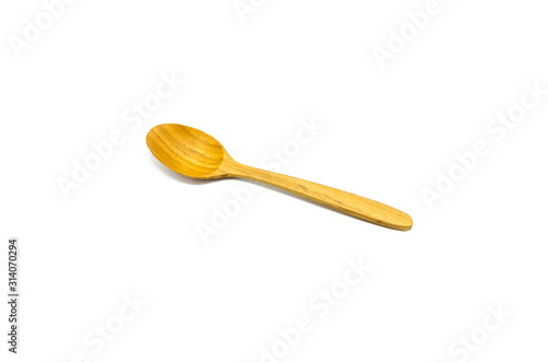 wooden spoon isolated over a white background.