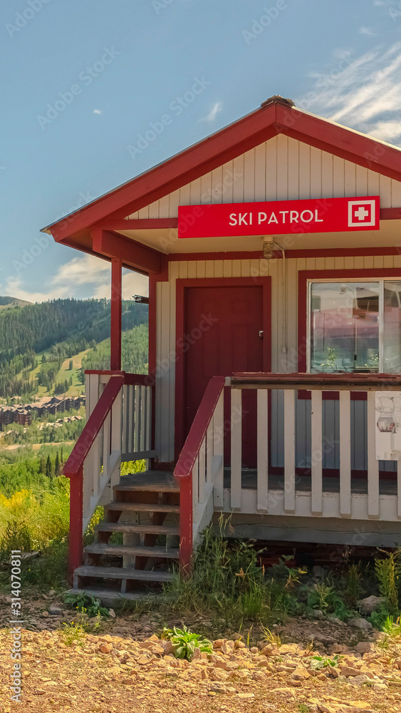 Vertical frame Facade of Ski Patrol building in Park City on a sunny day during off season Vertical frame Facade of Ski Patrol building in Park City on a sunny day during off season