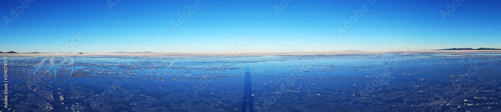 Fototapeta premium Sunrise view in Bolivia Uyuni salt desert