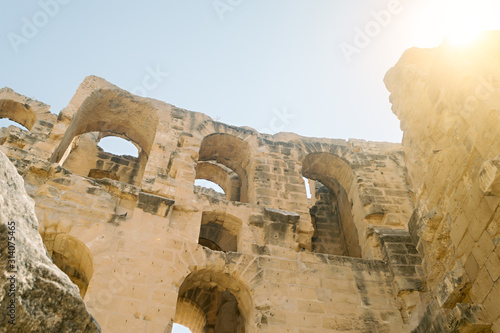 Sunlight in the ruins of an ancient Roman amphitheater in El Jem, Tunisia
