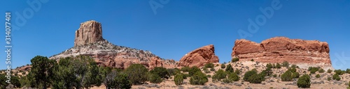 Square Butte landscape on a sunny day with mountains an trees  arizona