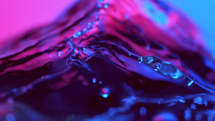 Detail of water waves in neon lights
