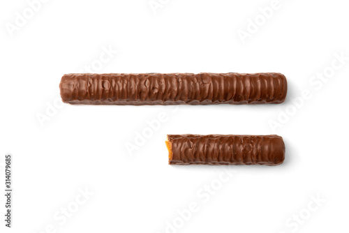 Shortbread stick with caramel in chocolate isolated on white background.