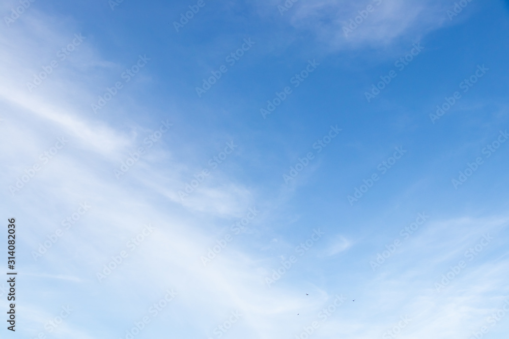 Clear blue color sky with white cloud background