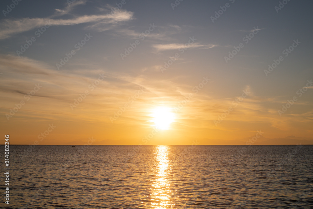 Sunset view from Elba Island. Orange pastel tone