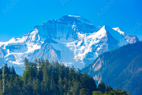 The mountain Jungfrau as seen from Interlaken, important tourist center in the Bernese Highlands, Switzerland. photo