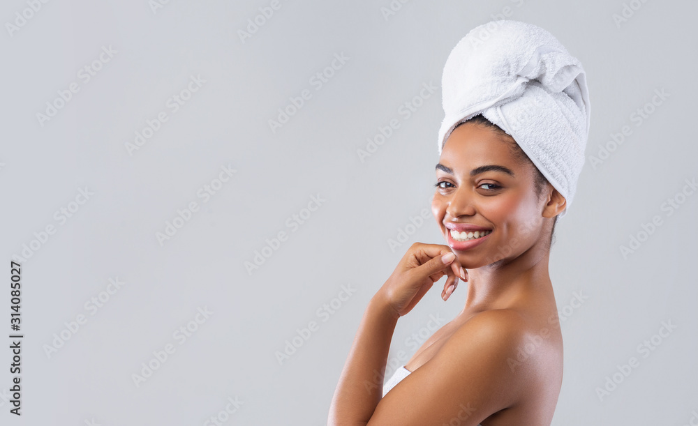 Profile portrait of pretty lady wrapped in towel Profile portrait of pretty lady wrapped in towel