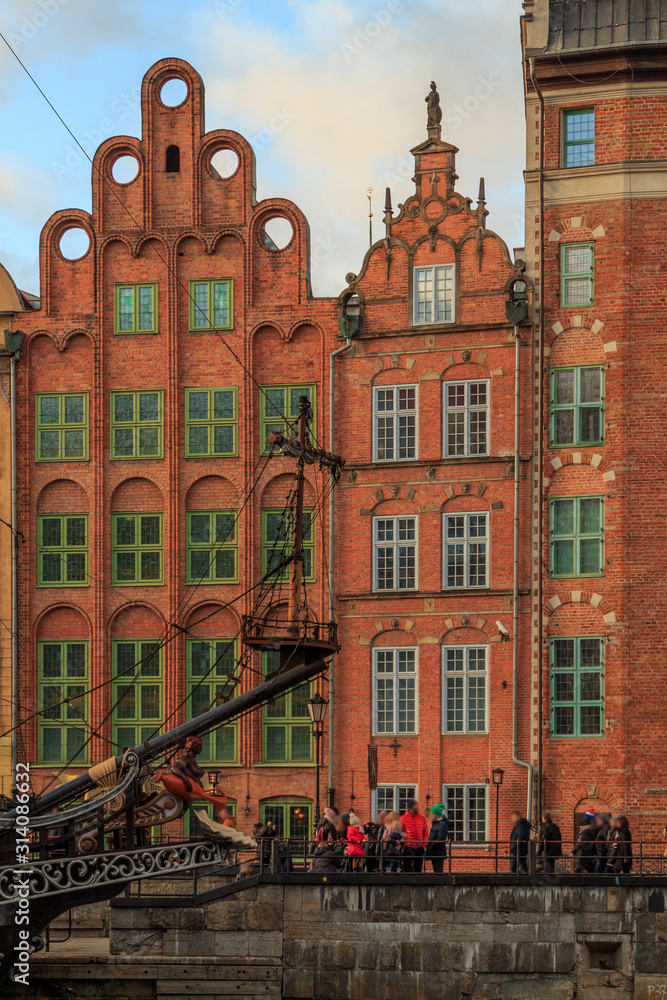 Gdansk city promenade in poland with beautiful old buildings and ships in winter