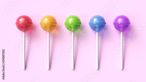 Set of five colorful sweet lollipops on pink pastel background