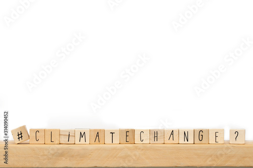 Wallpaper Mural Wooden cubes with a Hashtag and the word Climate Change, social media and environment concept near white background Torontodigital.ca