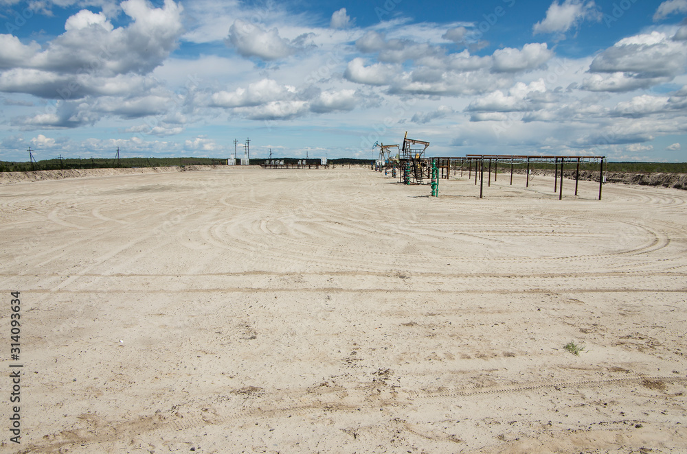 Oil production in Western Siberia. A group of pumpjacks. Oil production in Western Siberia. A group of pumpjacks.