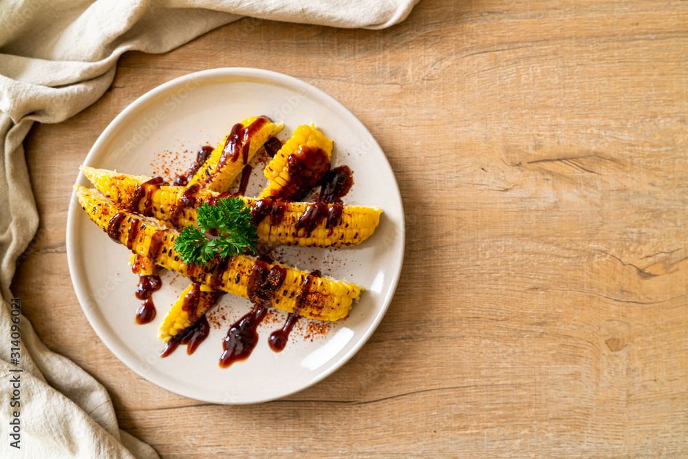 Fototapeta premium grilled corn with bbq sauce