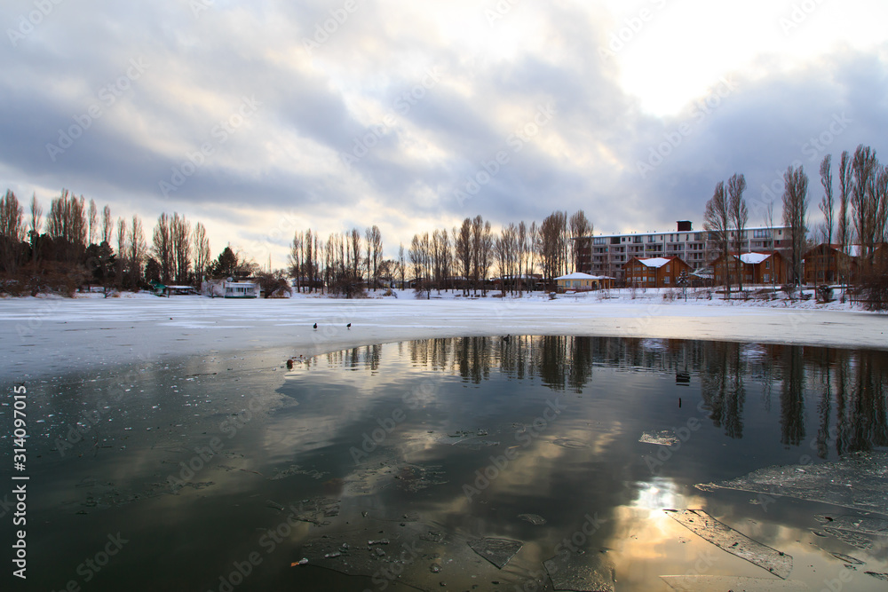 Sanatorium Aurora, Kyrgyzstan - January 4. 2020. Winter frozen lake. Nature of Kyrgyzstan